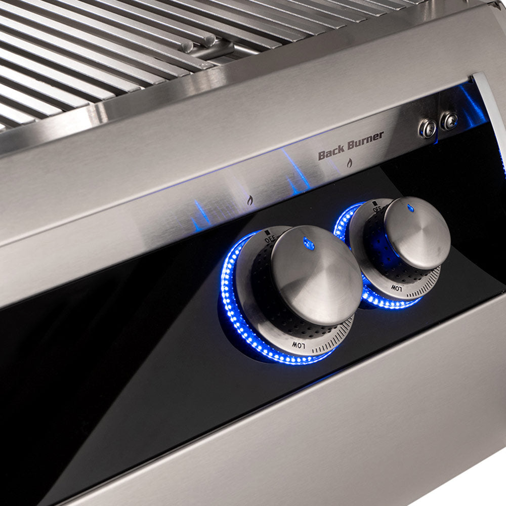 Built-in gas grill control area with blue LED-lit burner knobs and back burner label