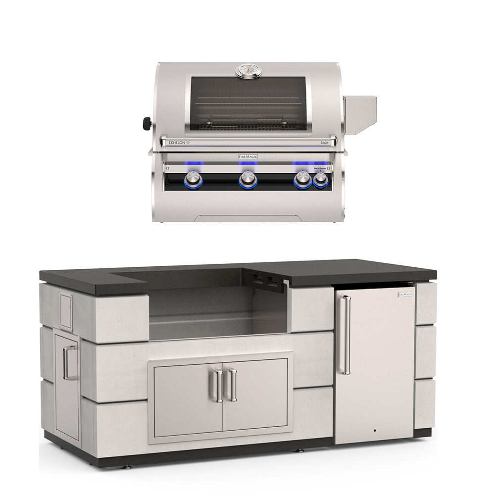 Fire Magic outdoor kitchen island with stainless grill controls, black countertop, lower cabinet, fridge
