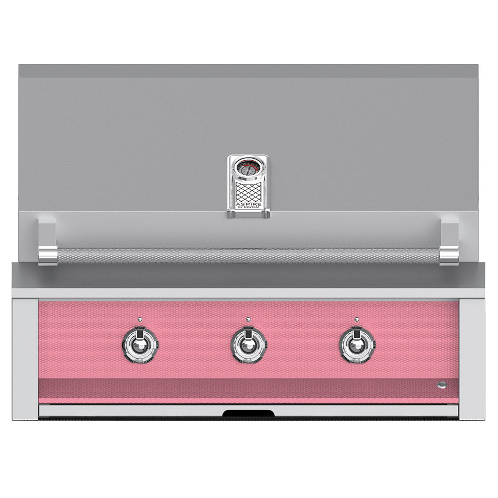Built-in gas grill with pink front panel and four round control knobs