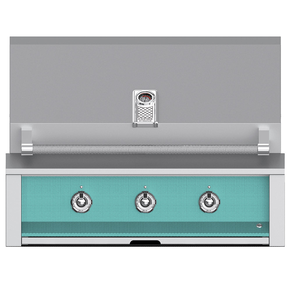 Built-in gas grill by Hestan, stainless front with four control knobs, teal burner panel