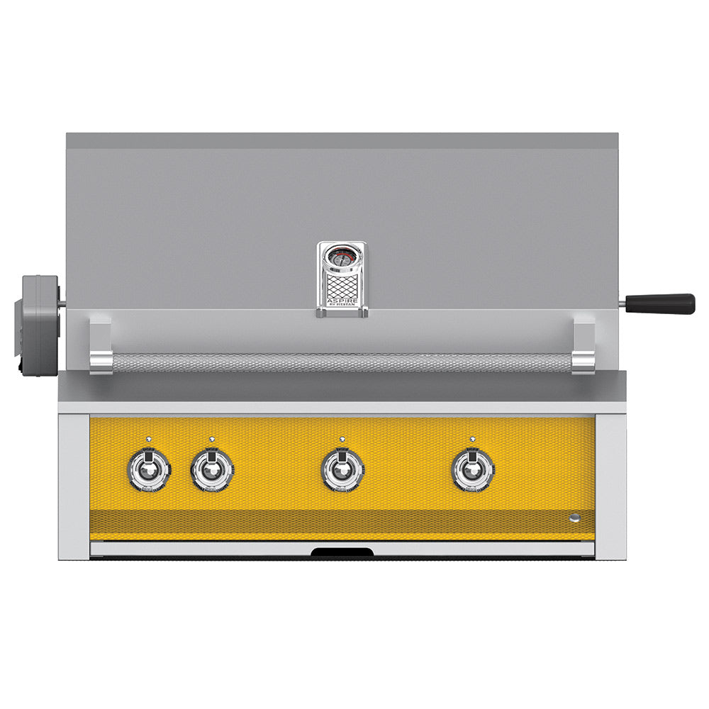 Built-in gas grill by Hestan, stainless front with four control knobs, gold burner panel