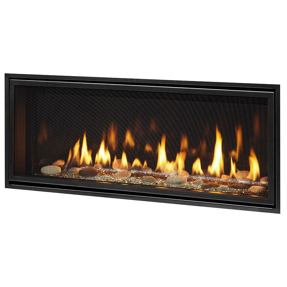 Black linear gas fireplace with glowing flames behind glass and stone ember bed