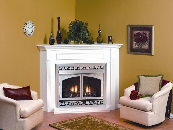 White corner cabinet mantel with fireplace insert, decorative screen and surrounding trim.