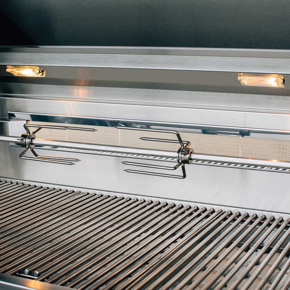 Stainless grill interior with lit burners under the cooking surface