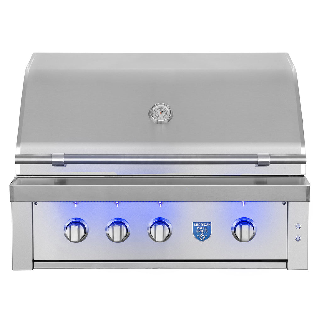 Built-in gas grill with stainless hood, control knobs, and front access panel