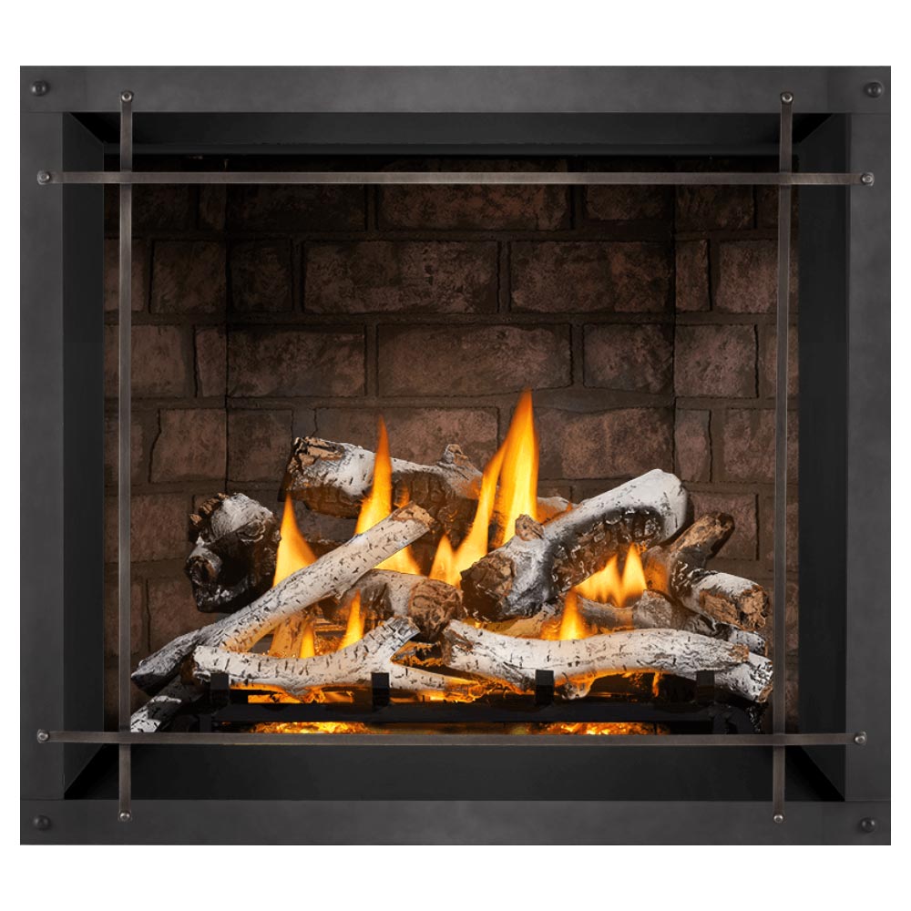 Direct vent gas fireplace with burning logs and dark stone backer behind framed metal screen