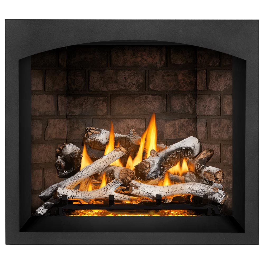 Black gas fireplace with burning log set, white log pieces, and embers in brown brick