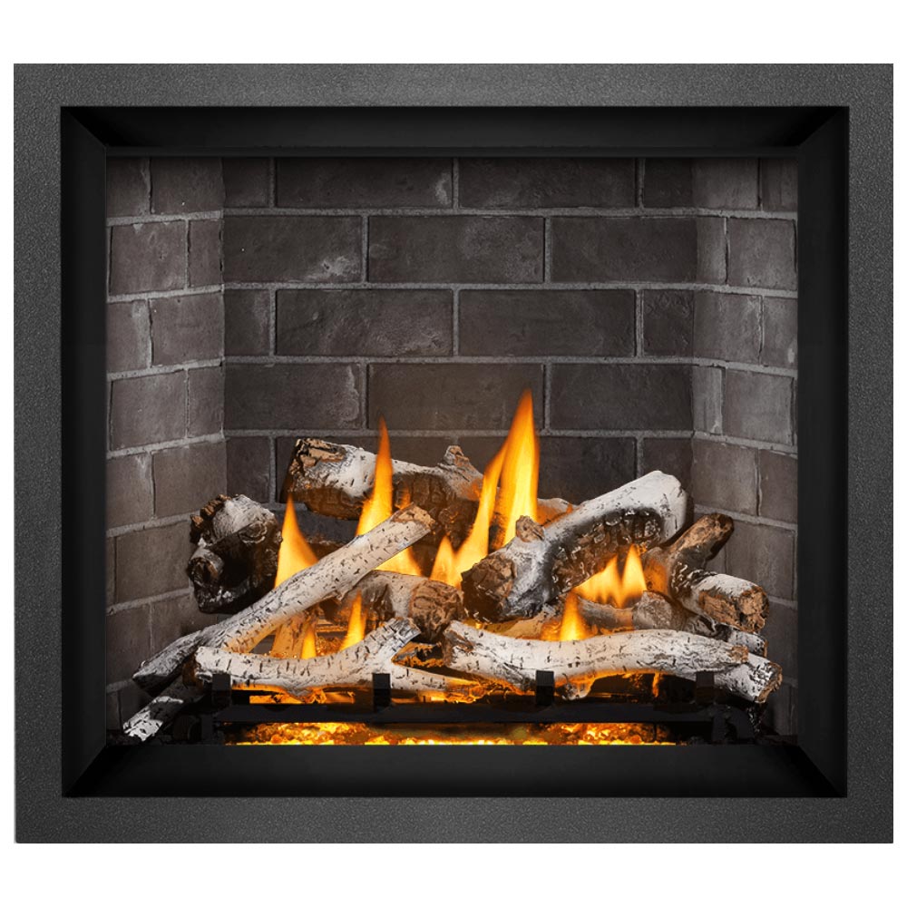 Direct vent gas fireplace with burning flames, split logs, and ash-covered ember bed
