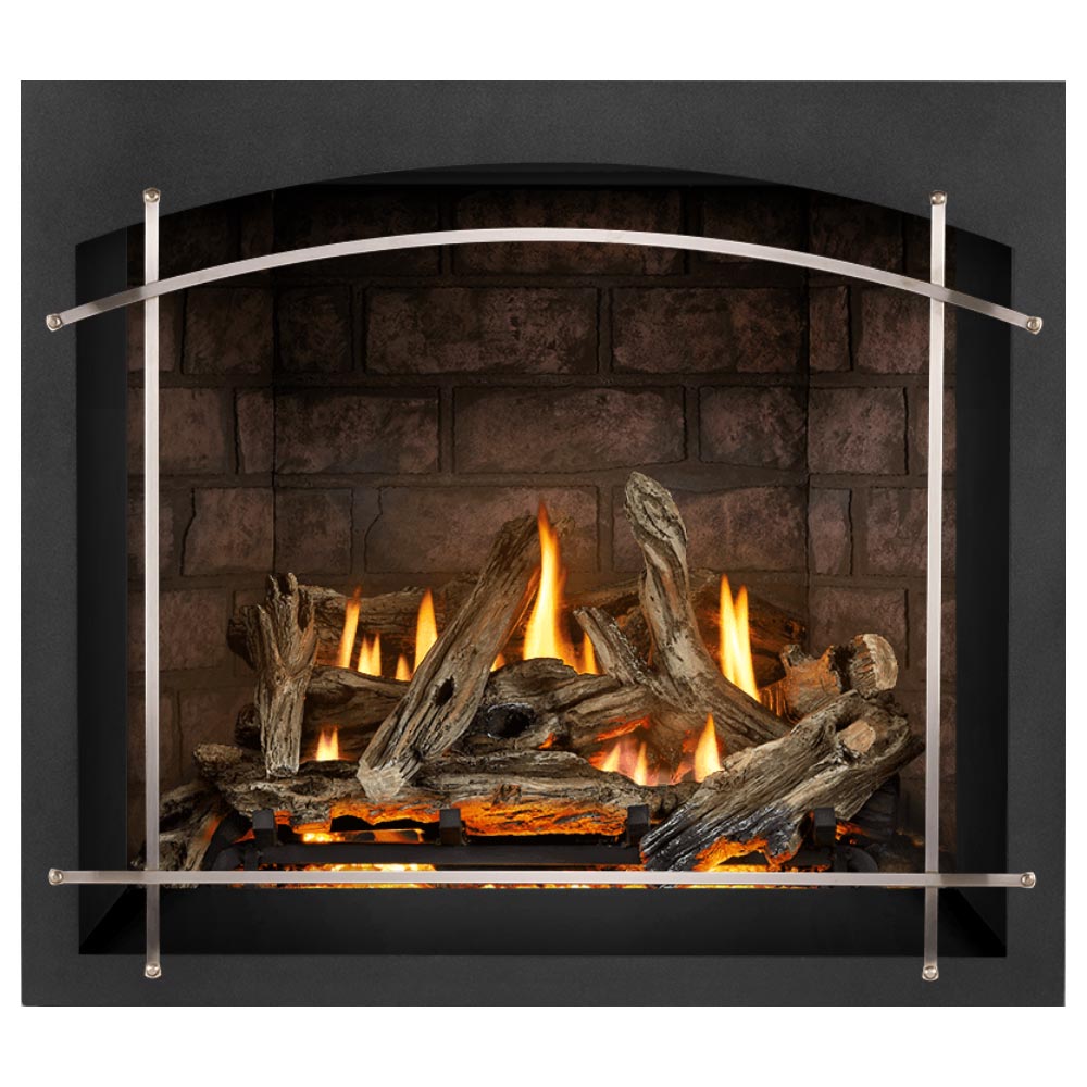 Direct vent gas fireplace with brick back panel and burning logs behind arched metal frame