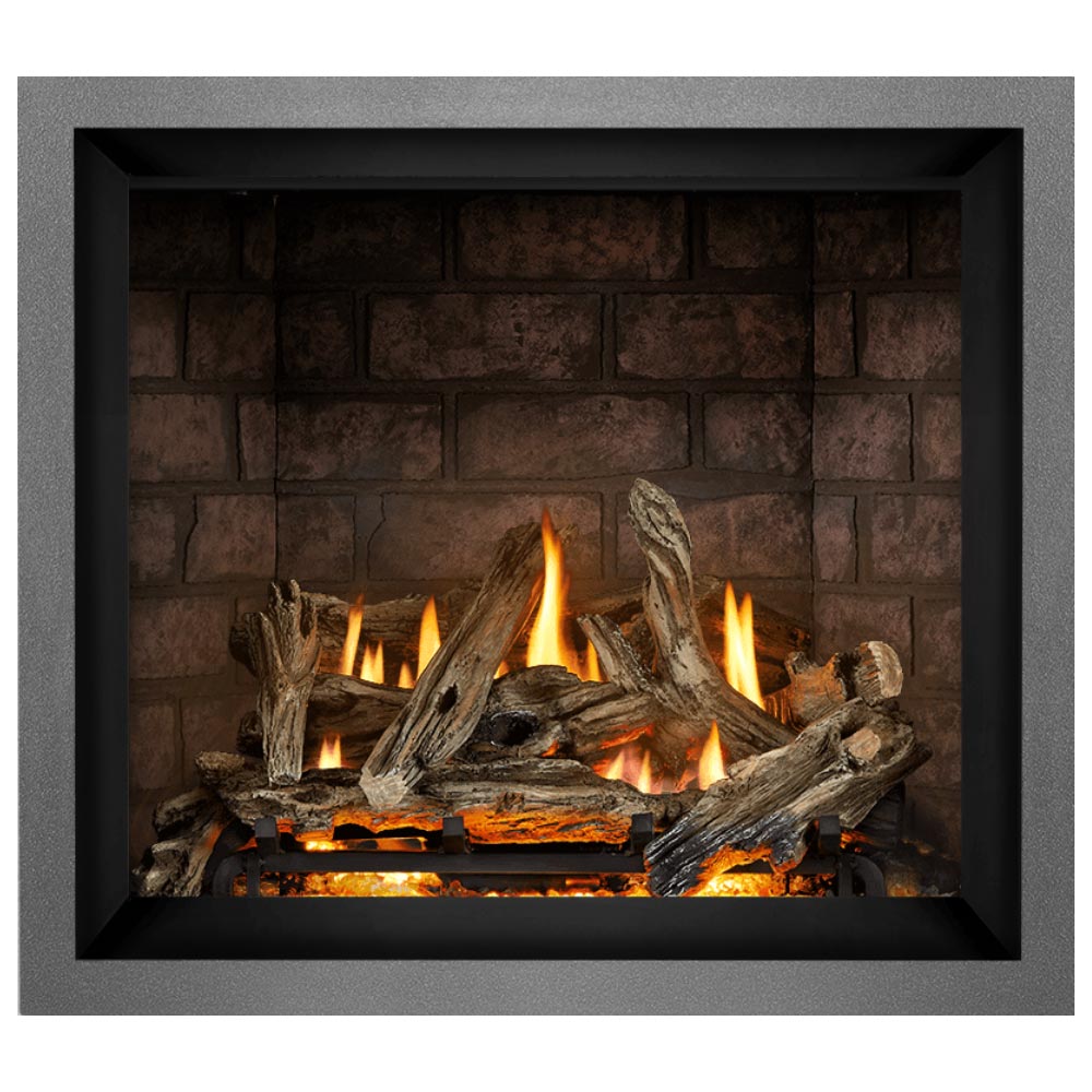 Direct vent gas fireplace with burning log arrangement and bright flames in the firebox.