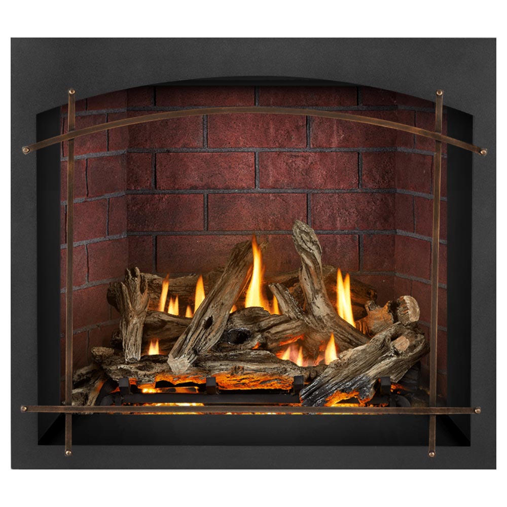 Direct vent gas fireplace with arched glass front and burning logs over embers in red brick