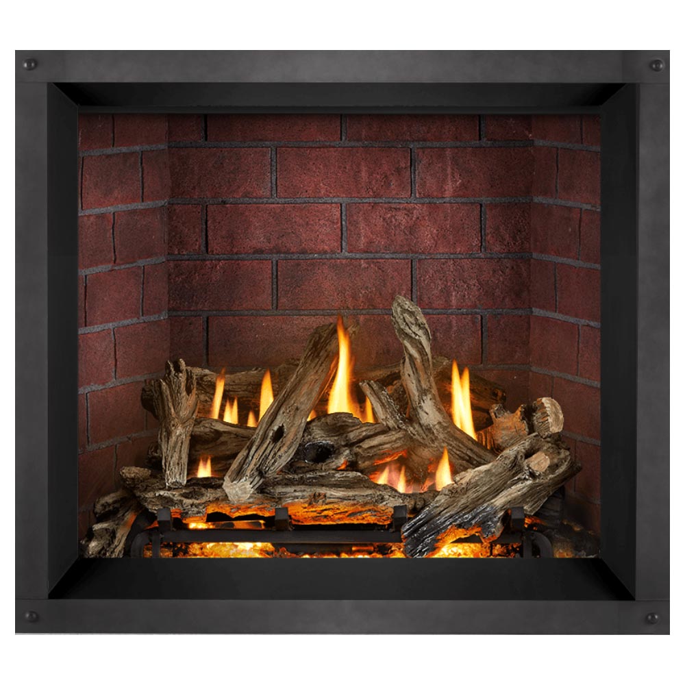 Direct vent gas fireplace insert with glowing flames and stacked logs against red brick wall