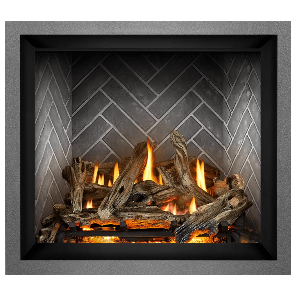 Direct vent gas fireplace with burning log pieces and orange flames inside the opening.