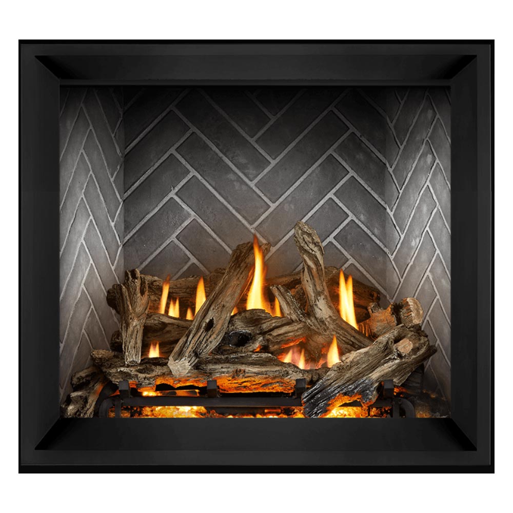 Direct vent gas fireplace with gray brick back, burning logs and bright orange flames