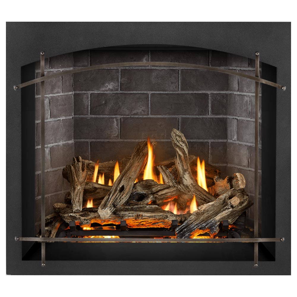 Direct vent gas fireplace with arched glass front and burning logs in gray brick