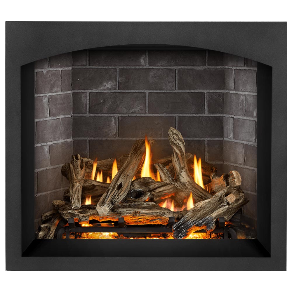 Gas fireplace with burning logs and flames, dark gray brick firebox interior