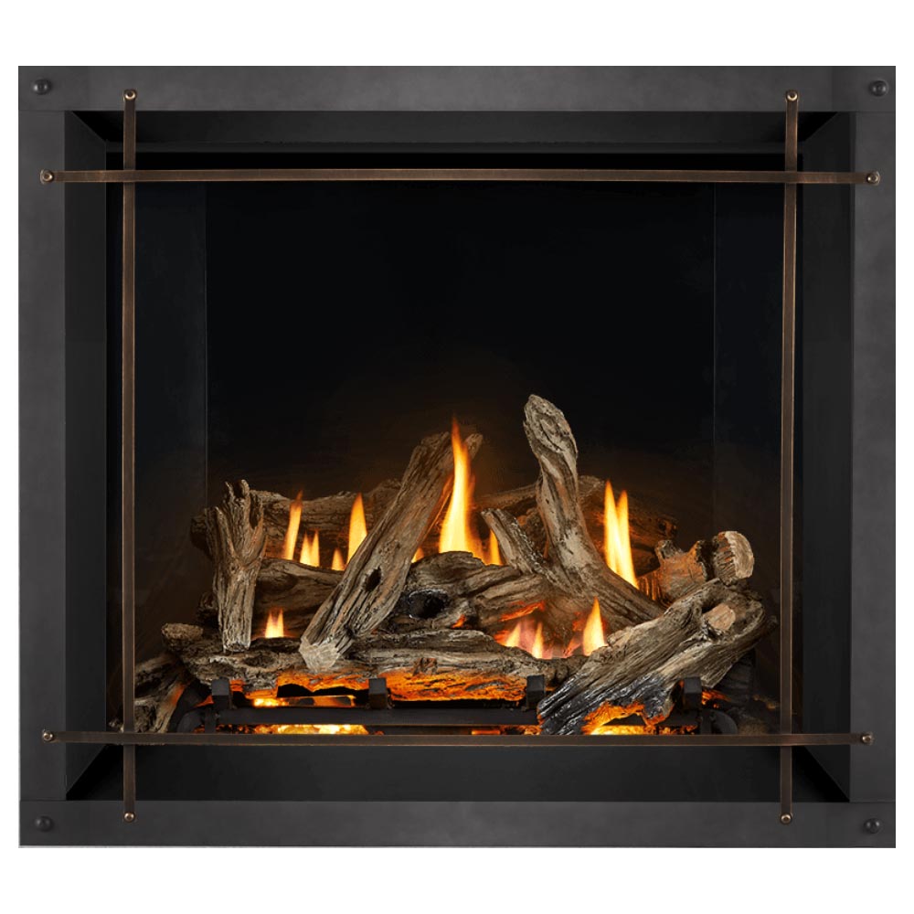Direct vent gas fireplace with burning logs and arched metal guard in the firebox