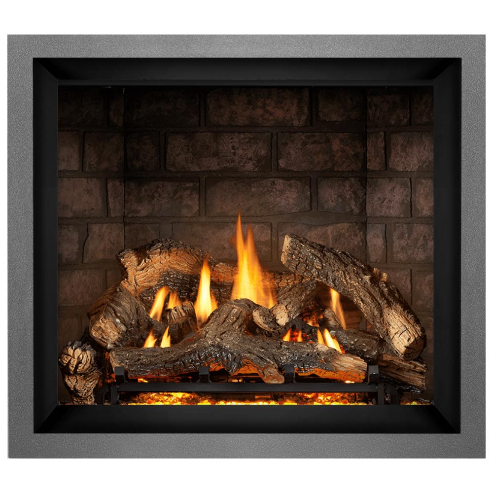 Direct vent gas fireplace featuring burning logs with tall flames inside the black opening.