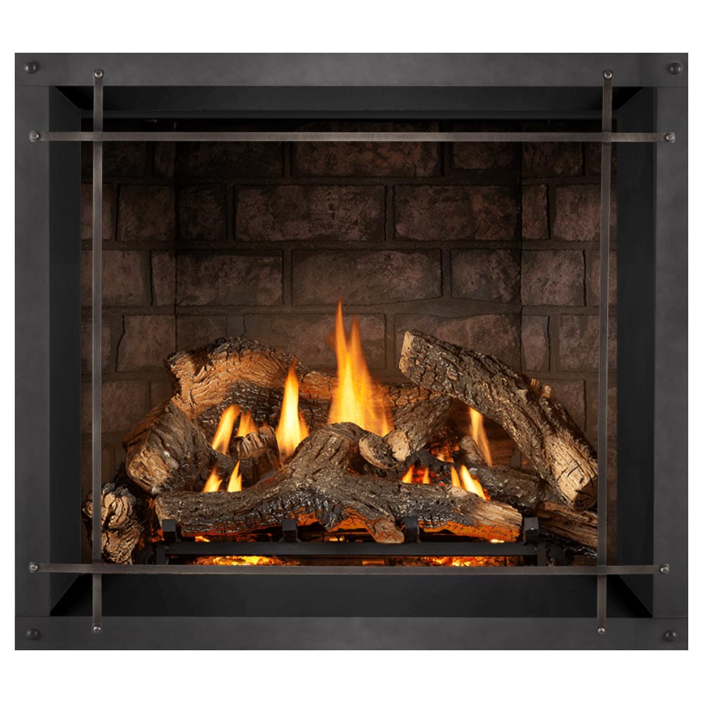 Direct vent gas fireplace with burning logs and dark metal frame around the firebox