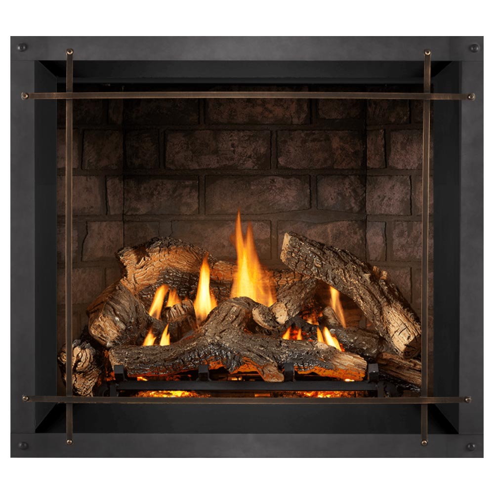 Direct vent gas fireplace featuring flames over stacked logs and dark stone back panel