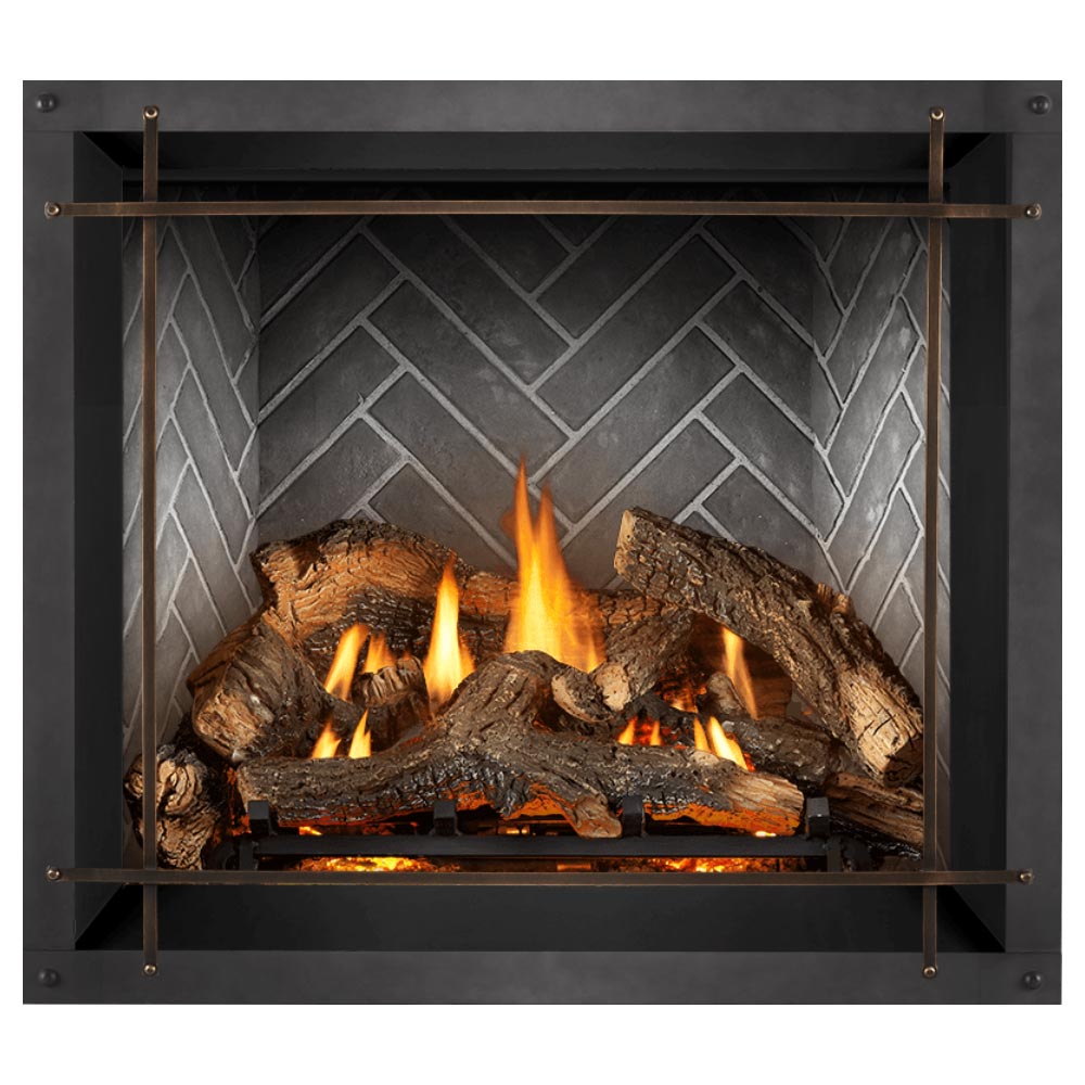 Direct vent gas fireplace with flames and stacked logs behind light gray herringbone back panel