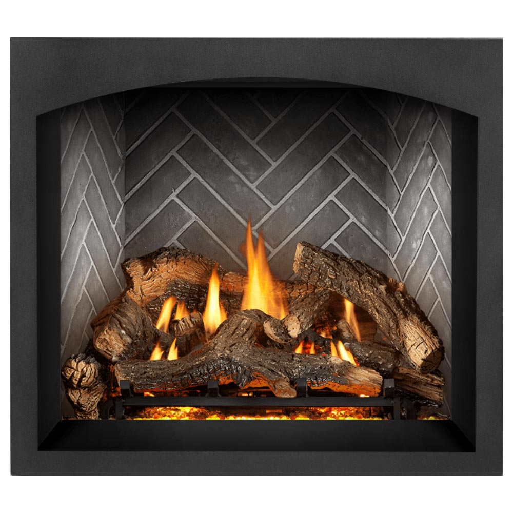 Direct vent gas fireplace with flames over logs and glowing embers in dark firebox
