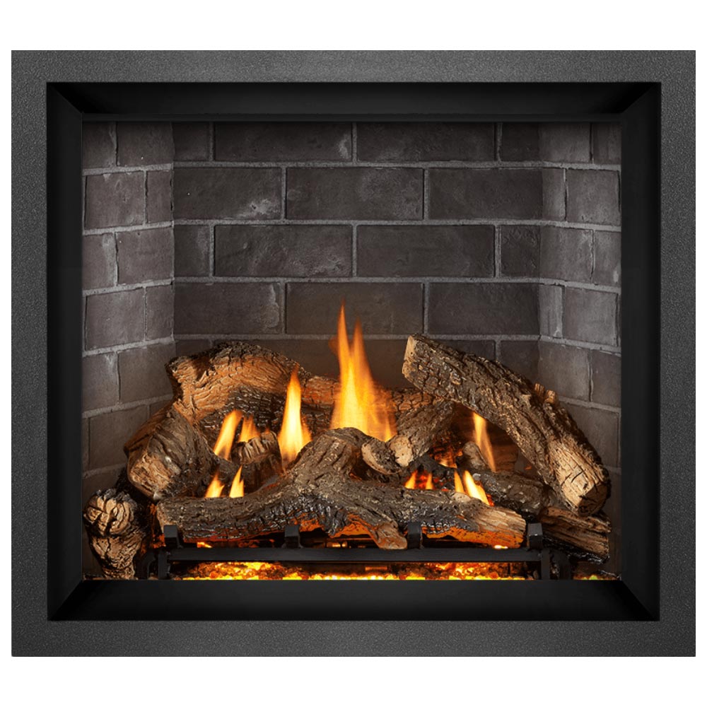 Direct vent gas fireplace with burning flames behind logs and a blackened ember grate