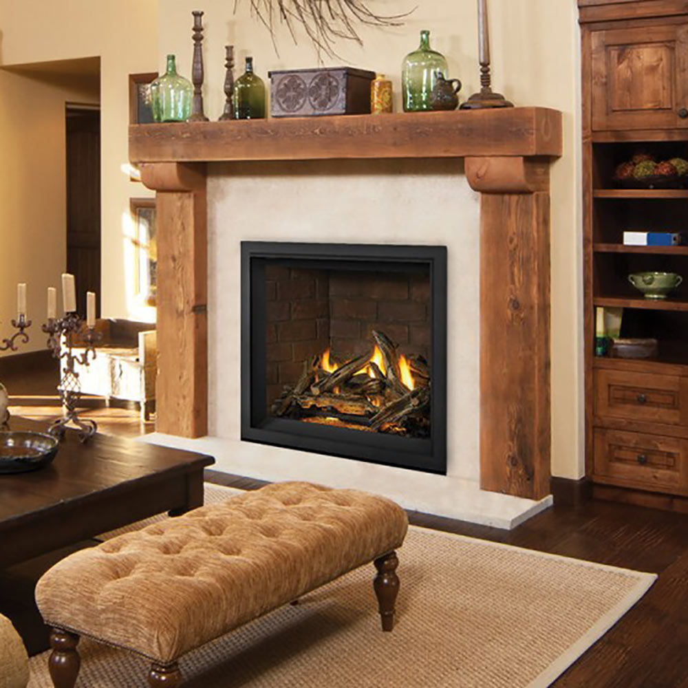 Black direct-vent gas fireplace in a room, showing flames and logs behind glass