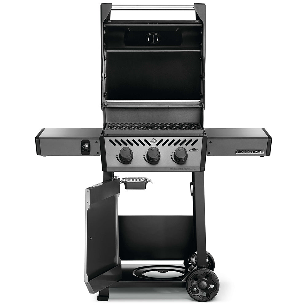 Freestyle 365 gas grill with lid open, cooking grates and front control knobs
