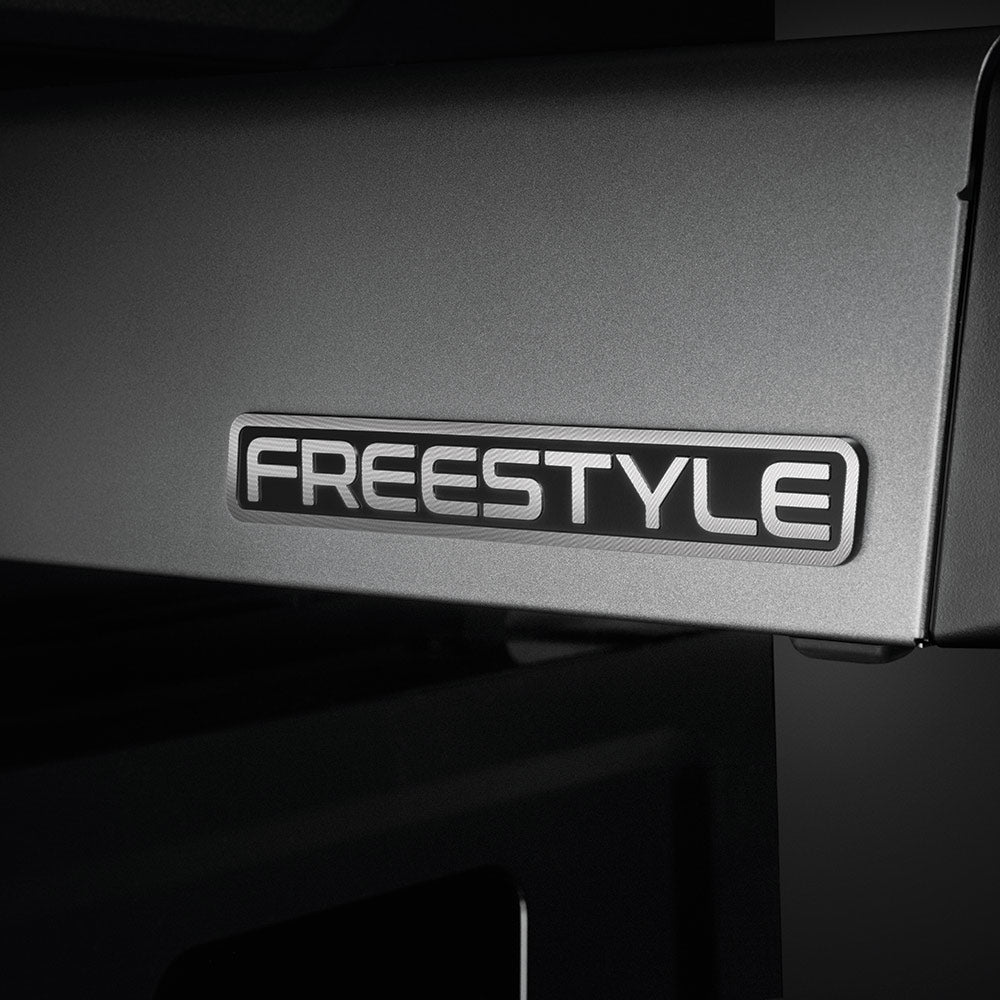 FREESTYLE logo panel on the propane gas grill body