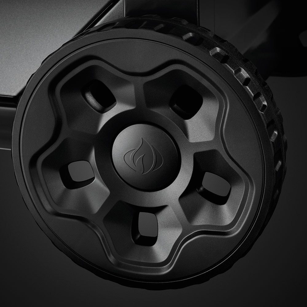 Propane gas grill cart wheel with textured tread and flame emblem center