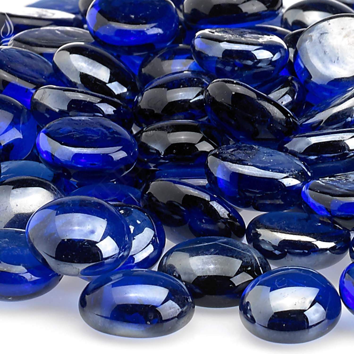 Close-up of royal blue glossy fire glass beads with reflective highlights
