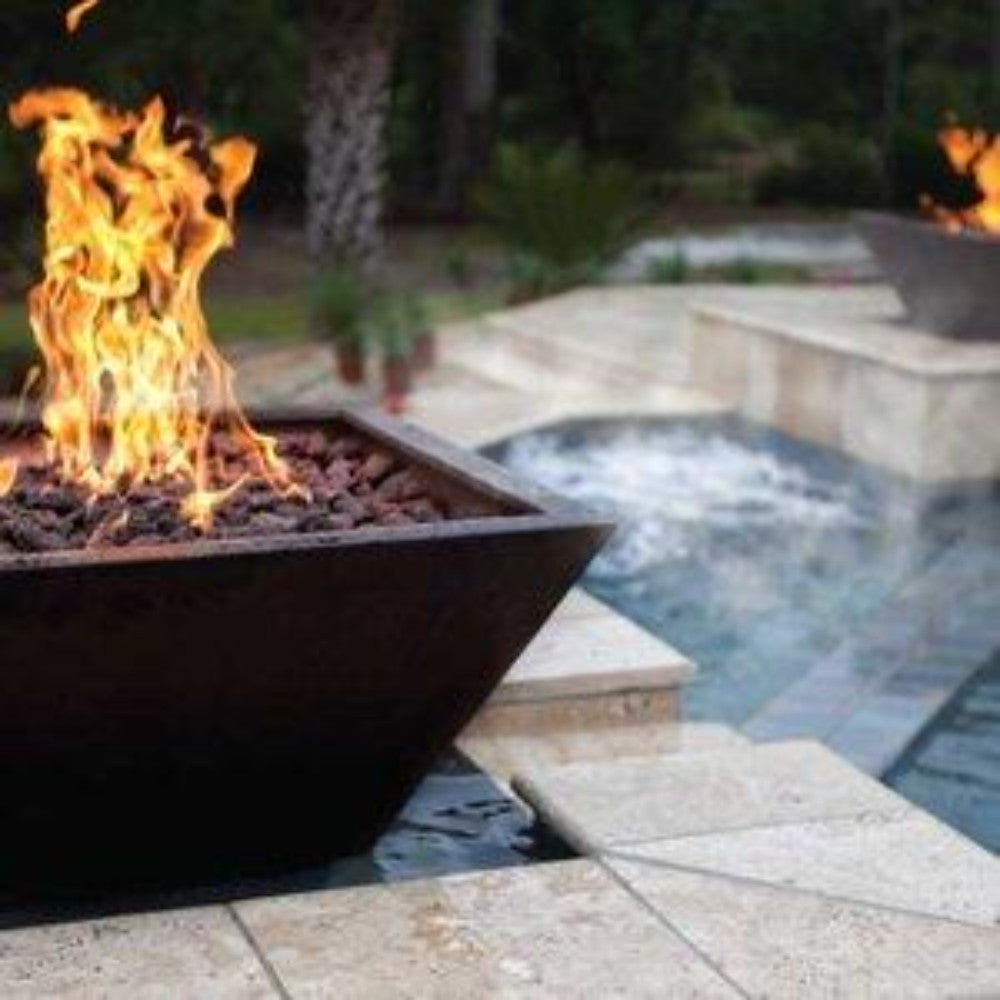 Square gas fire bowl with flames and lava rocks, dark hammered copper sides