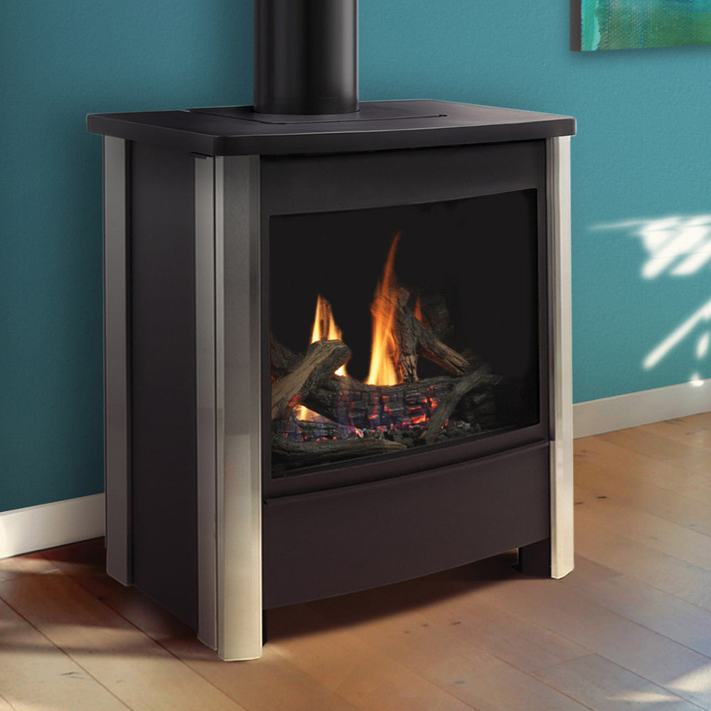 Freestanding gas stove with black hood and glass front showing burning logs