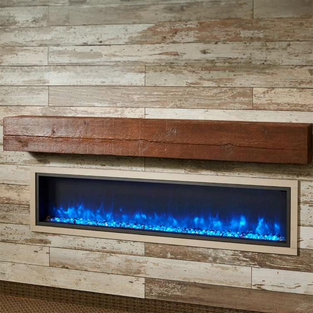 Tavern brown mantel shelf mounted over a fireplace insert opening with blue flame