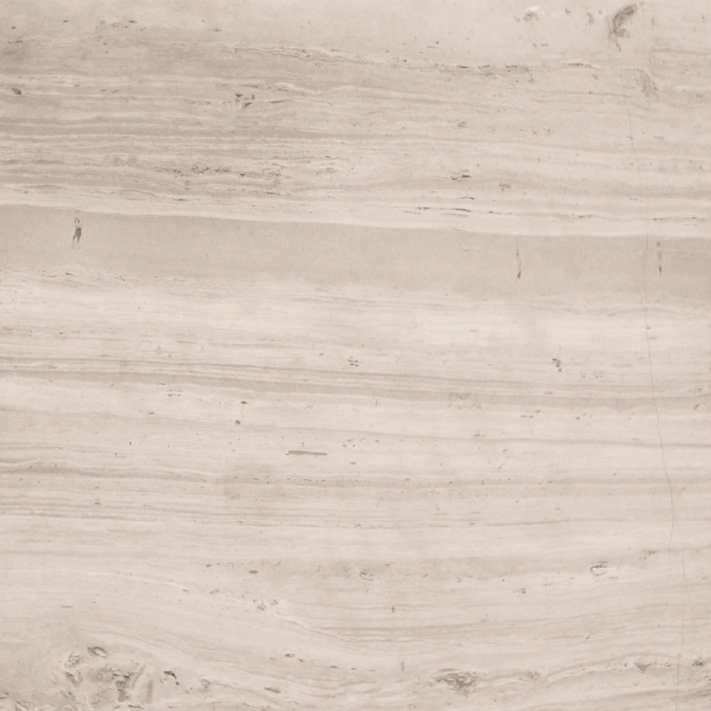 Light driftwood marble stone surface with natural veining, surround header