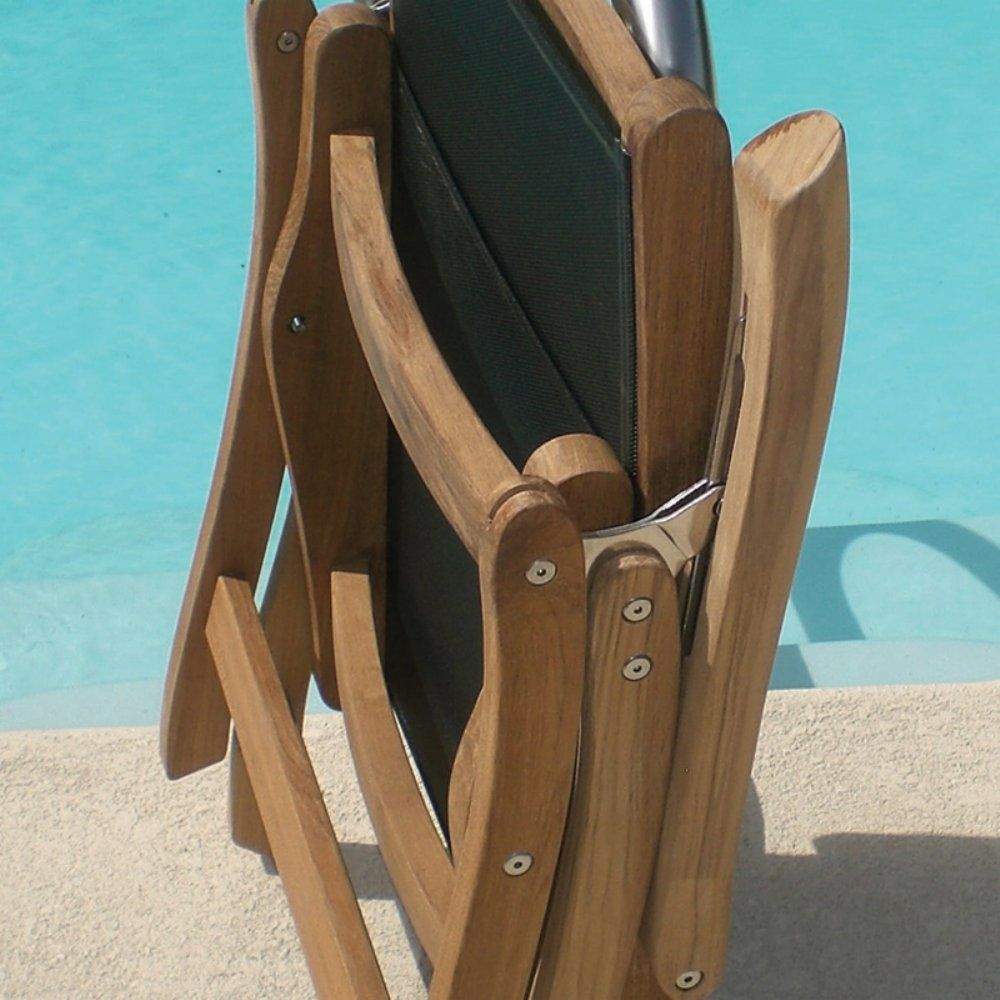 Teak sling chair close-up with dark fabric back and seat, curved wooden arms with bolts.