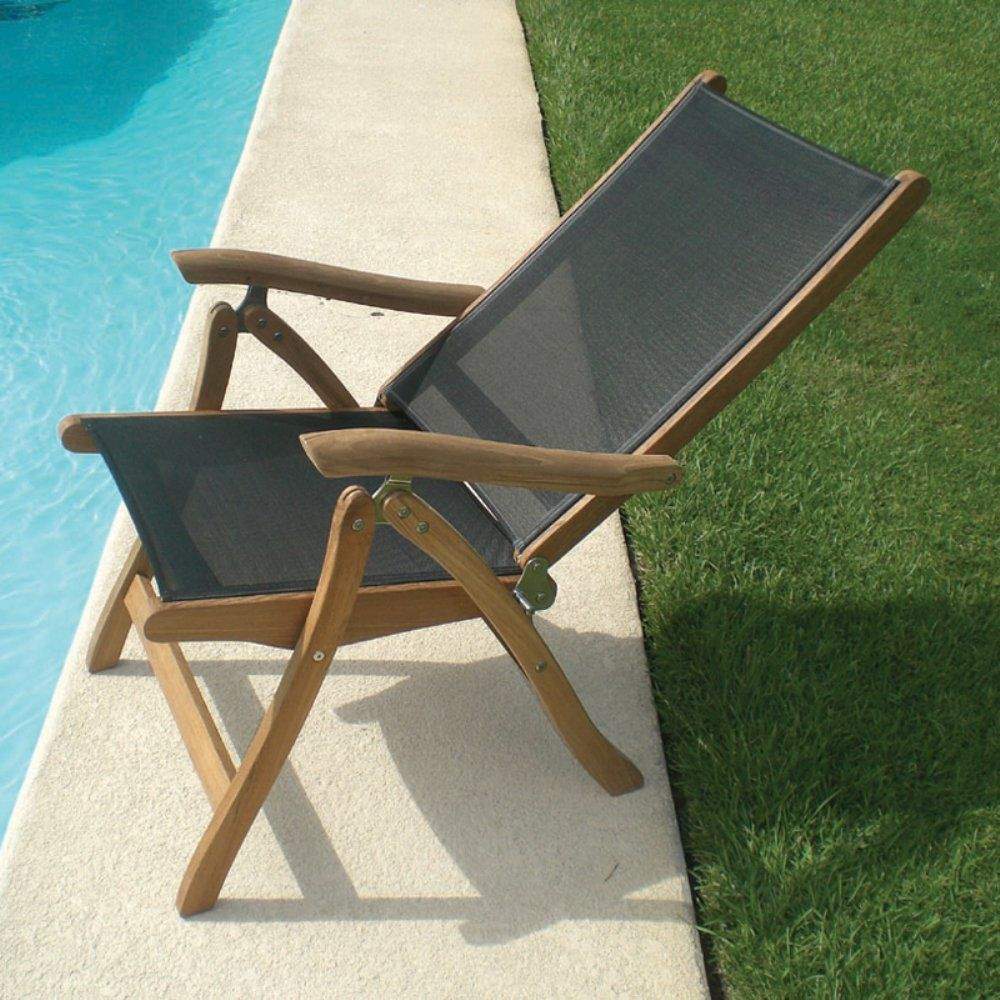 Teak sling chair with dark gray fabric seat and back, slatted arms and folding base.