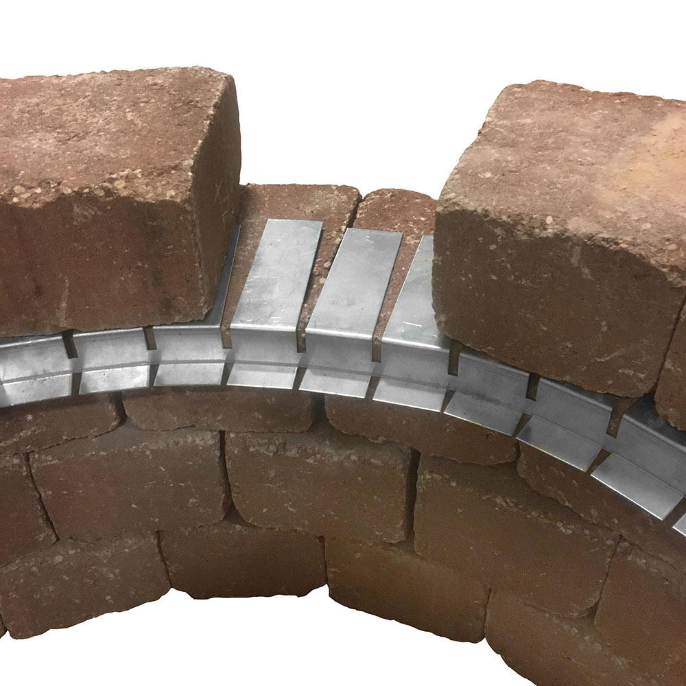 Stainless steel flexframe edging around brick fire pit with vertical mounting tabs