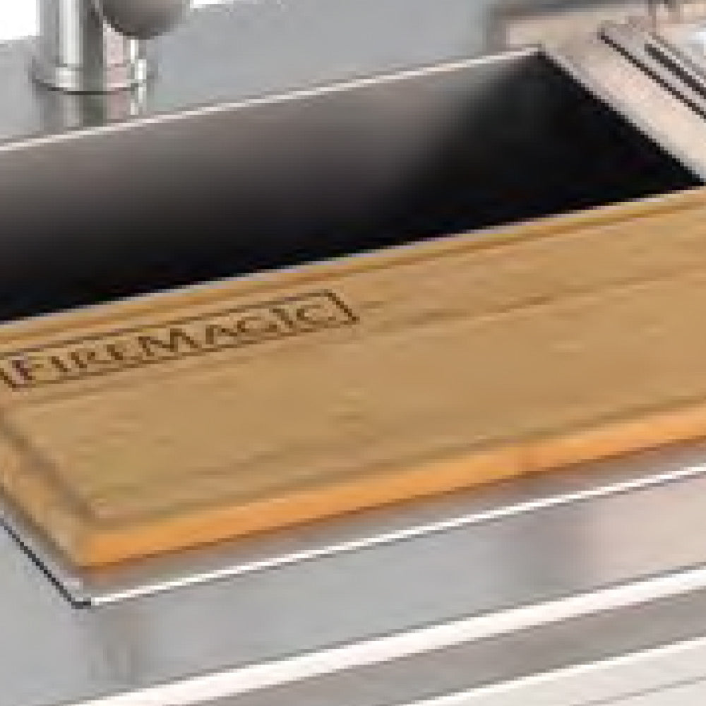 Stainless sink cover with Fire Magic engraved wood board and two burner wells