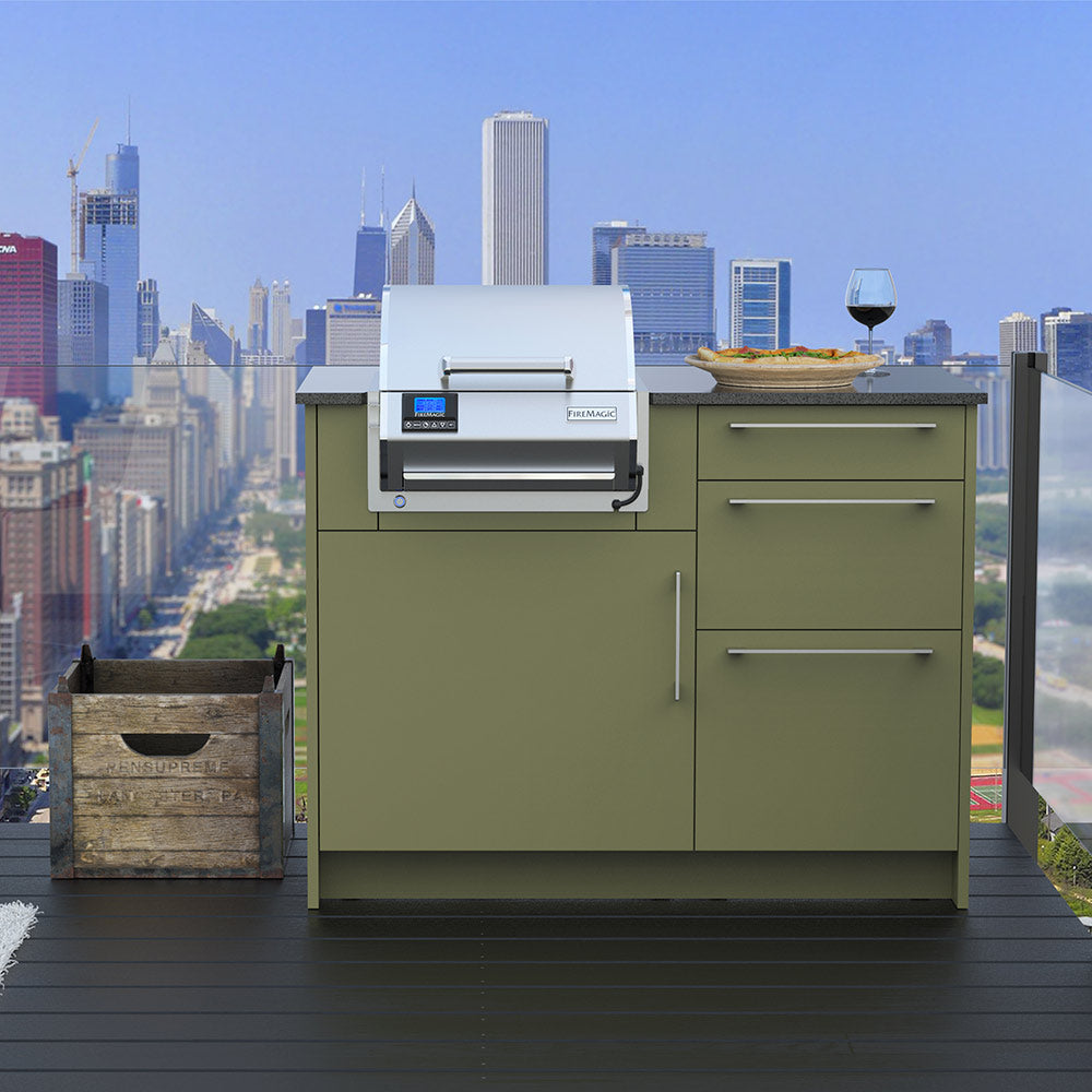 Built-in electric grill on outdoor island with stainless hood and side control screen
