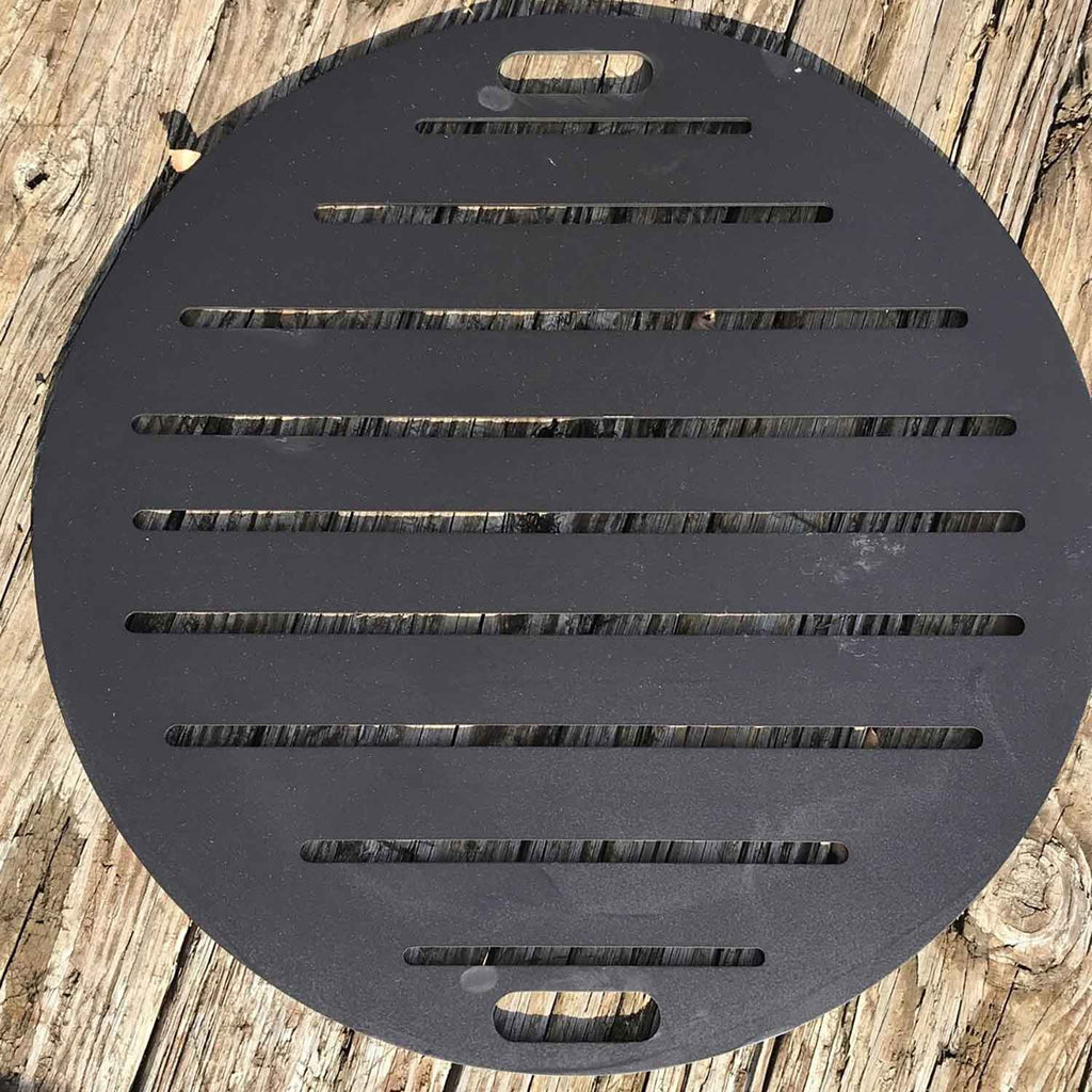 Round carbon steel fire pit lid with rectangular vent slots