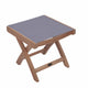 Teak sling footrest with gray fabric cushion and teak wood frame