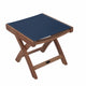 Teak sling footrest with deep blue fabric cushion and teak wood legs