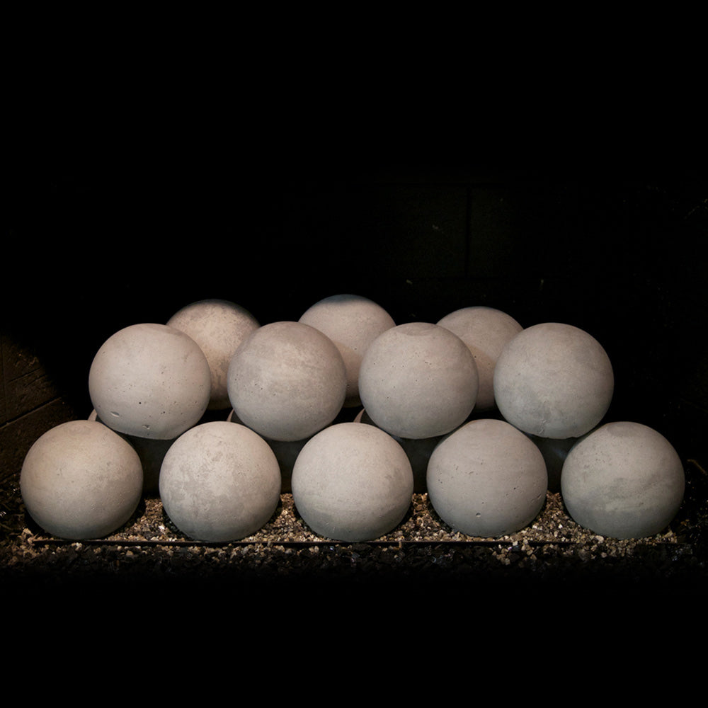Gray matte fire sphere set, four-piece arrangement of round concrete balls