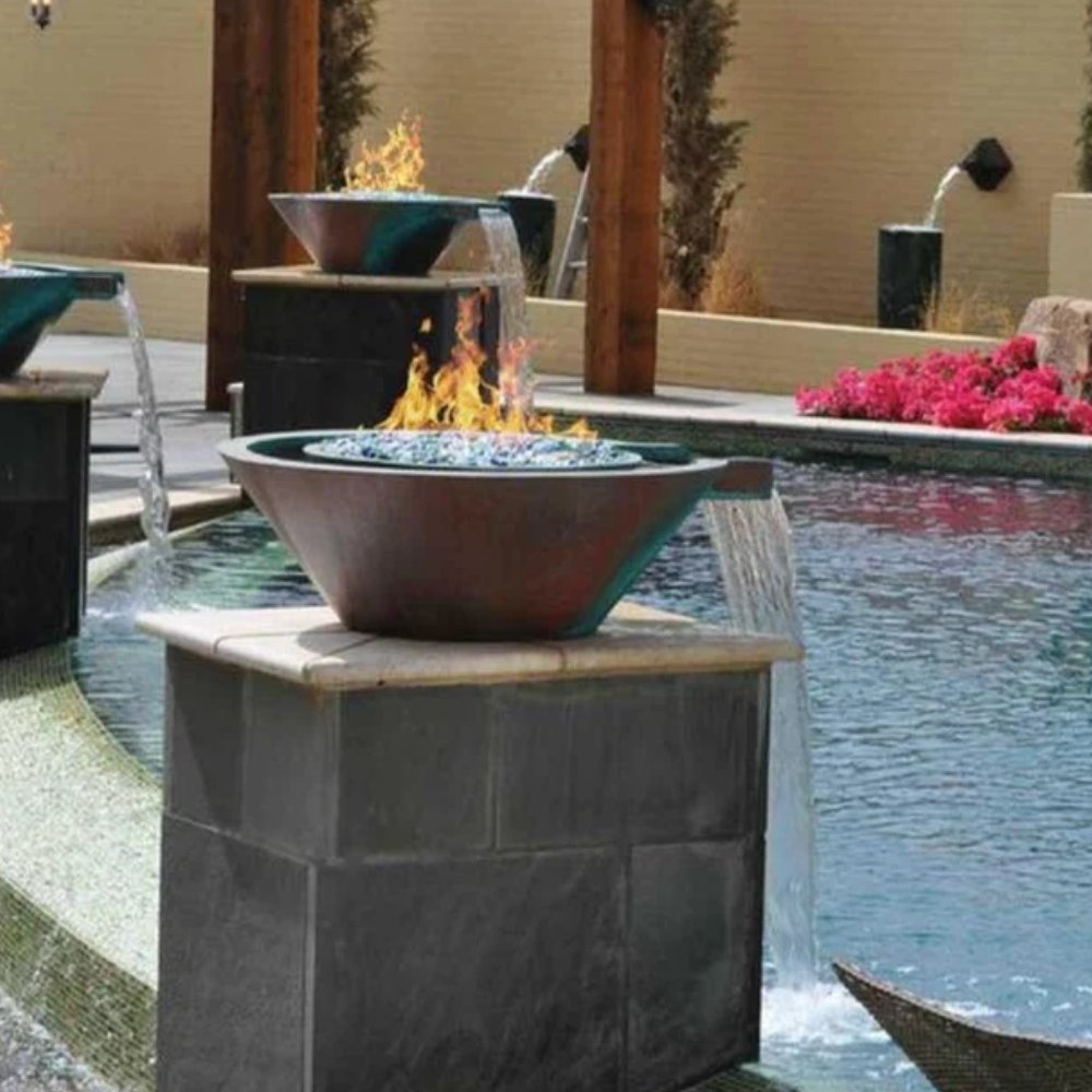 Copper gas fire and water bowl on stone base, flames with falling water