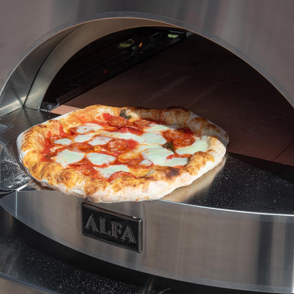 Alfa gas pizza oven with a pizza baking inside stainless cooking chamber