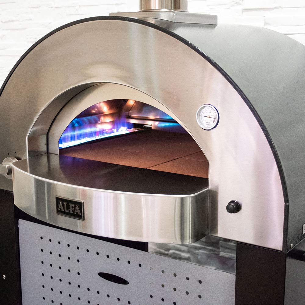 Gas pizza oven with open dome showing glowing burner and interior arch