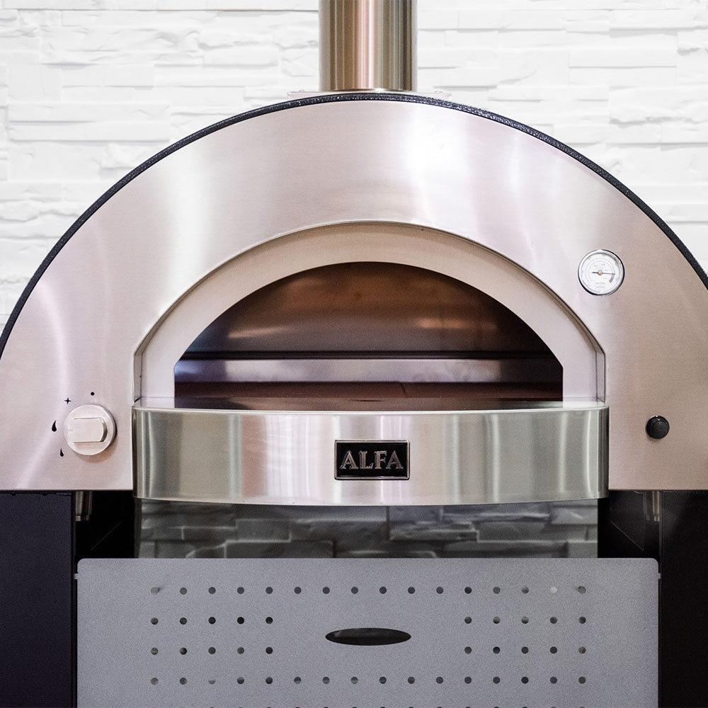 Gas pizza oven front view with round dome, gauge, and open cooking chamber