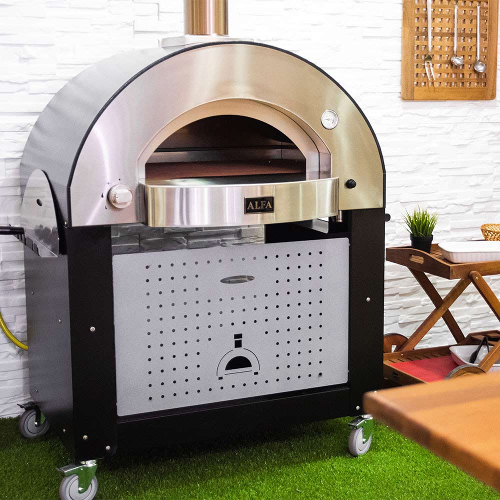 Freestanding gas pizza oven on wheels with open arch and front ventilation panel